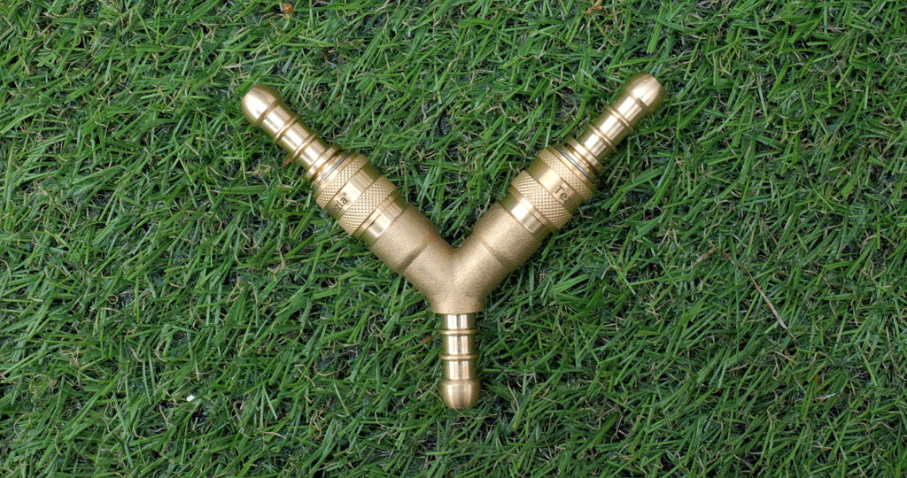 Y-shaped 3-way gas hose splitter coupling connector with quick-release fittings, designed for use with 8mm propane or butane hoses, allowing connection of two appliances to a single gas bottle.